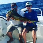 Man & Boy with Mahi-Mahi
